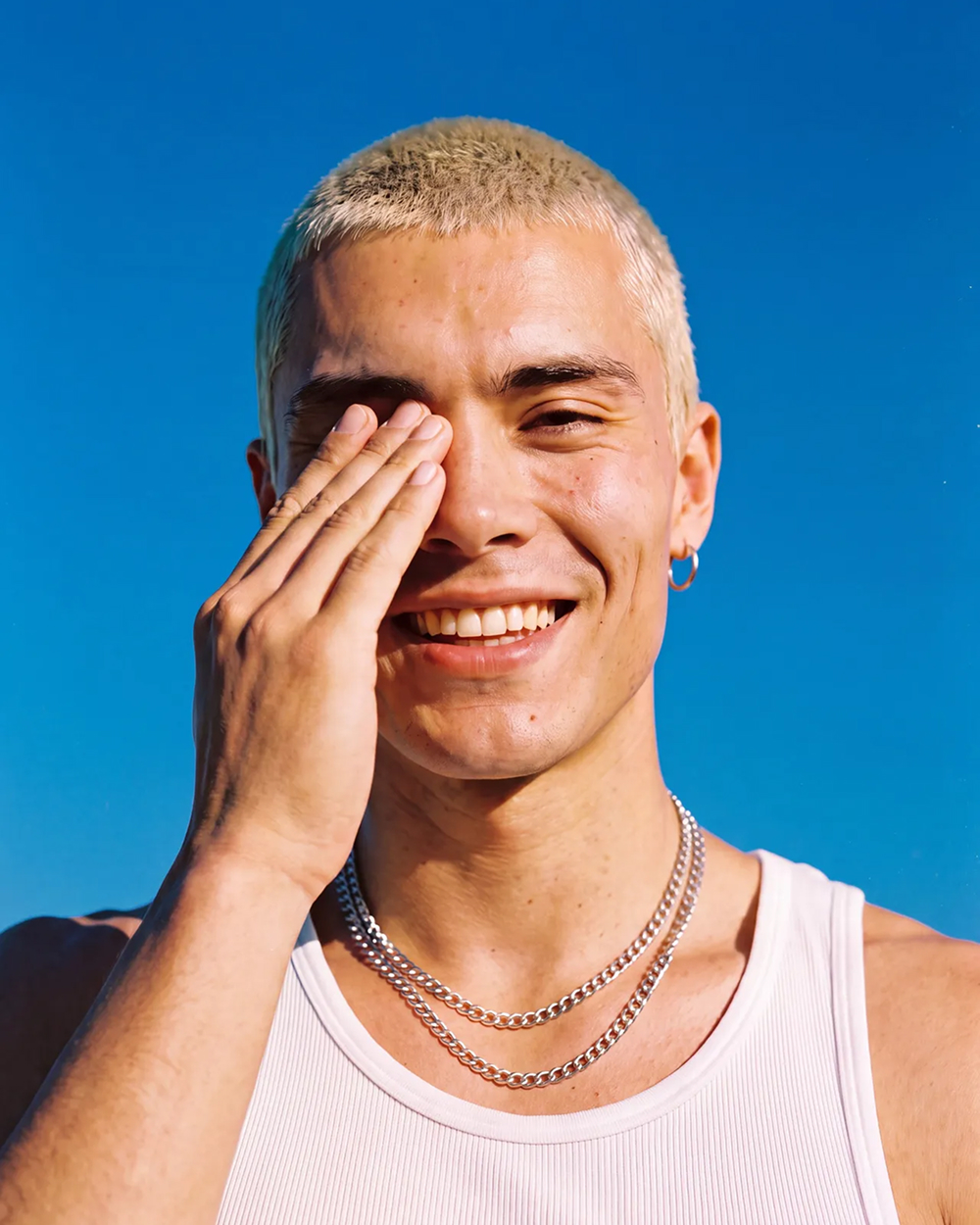 blonde man blue sky